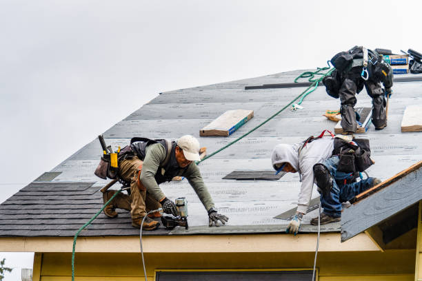 Professional Roofing technician working in Goshen, CA